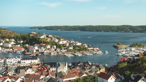 Boating-activity-along-the-marina-in-Kragero,Norway---timelapse