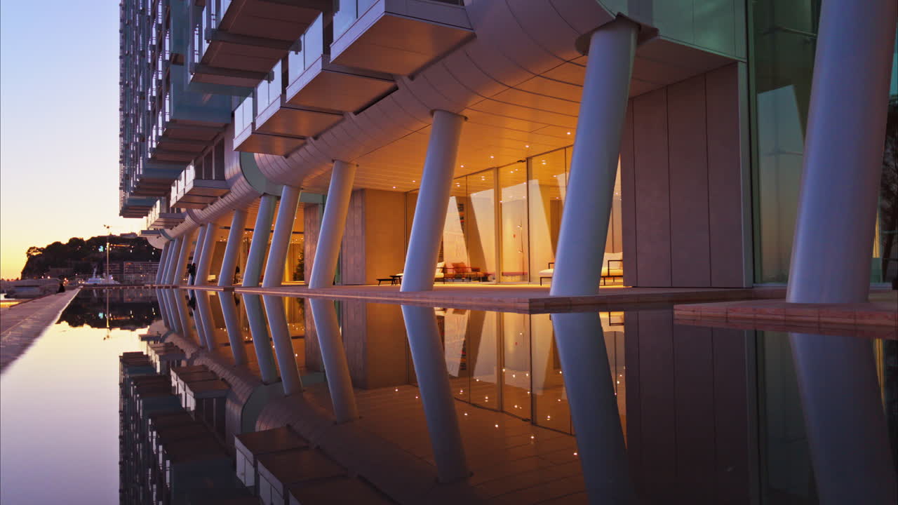 Close up of a building in the Mareterra new Residential district in Monaco in the evening