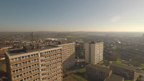 Aerial-footage-view-of-high-rise-tower-blocks,-flats-built-in-the-city-of-Stoke-on-Trent-to-accommodate-the-increasing-population,-council-housing-crisis,-Immigration-housing