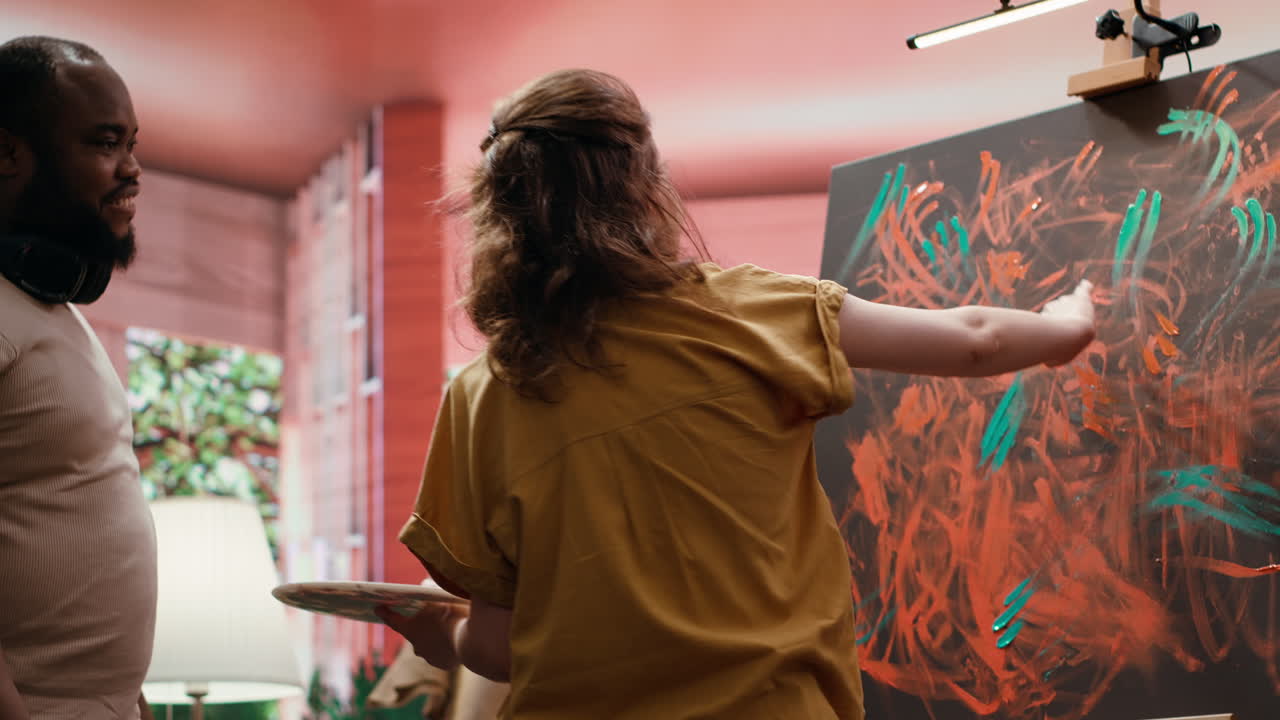 Couple Painting Together in Art Studio