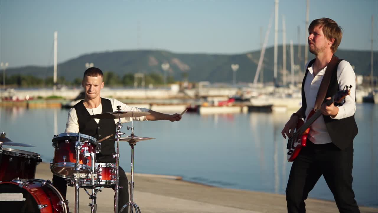 A Band Performing by the Waterfront