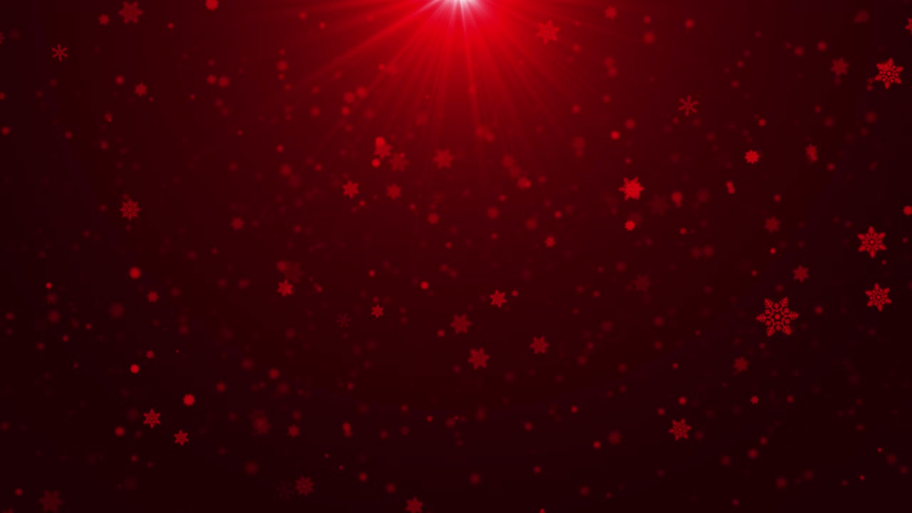 Red snow particles gently falling through glowing sunray light create dreamy atmosphere this footage