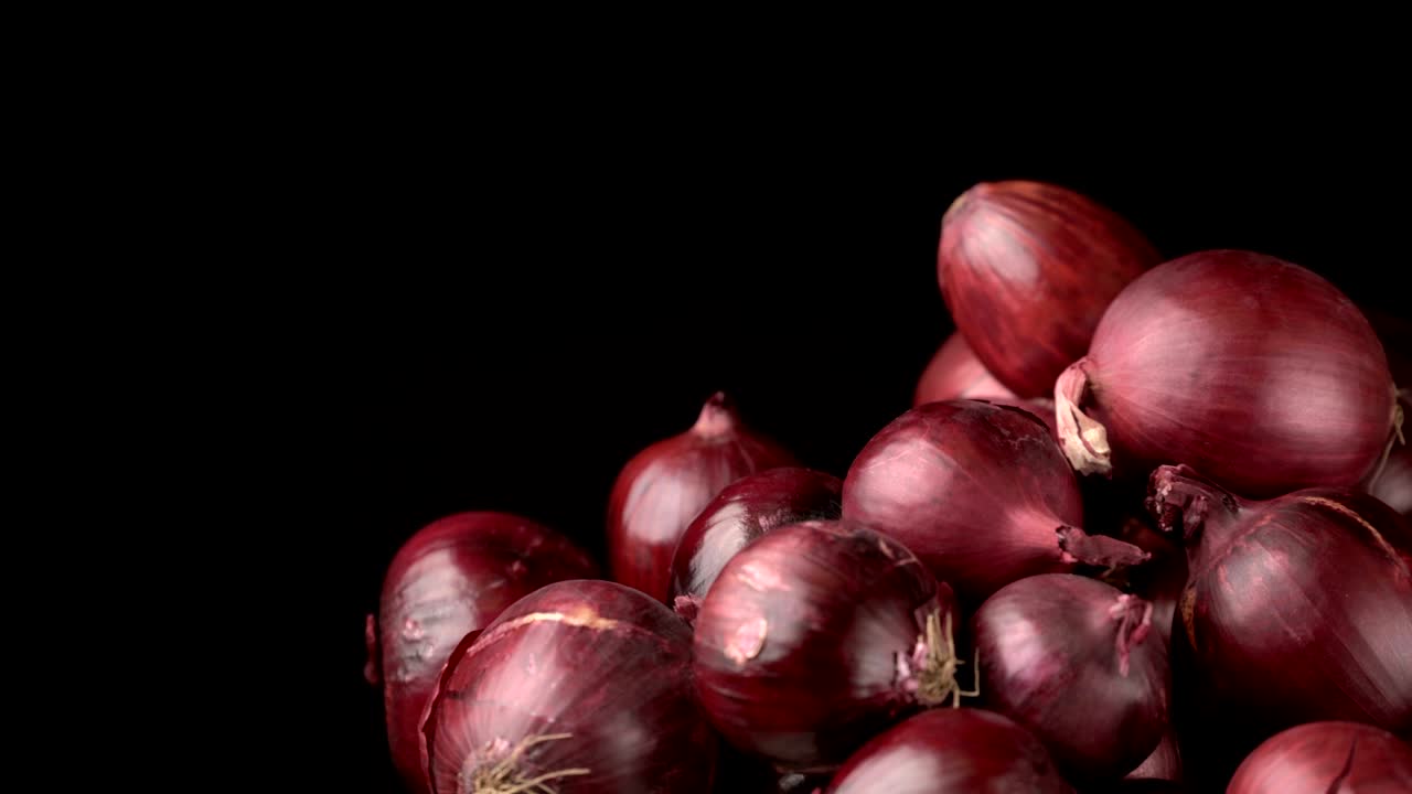 fondo de cebollas rojas giratorias