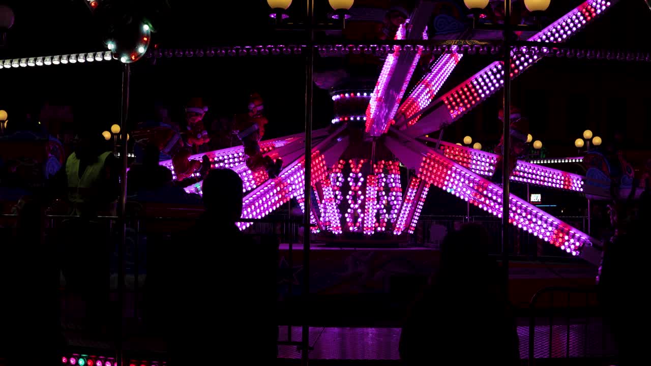 Spinnig Carousel on Christmas Market 4K