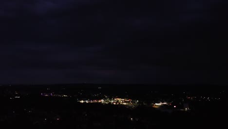 thunder and lightning in a storm cloud-filled night sky-1