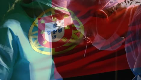 animation of flag of portugal waving over surgeons in operating theatre