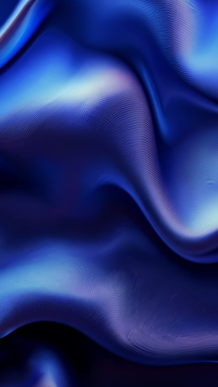 A blue wave with a lot of detail. The blue color is very vivid and the wave is very long
