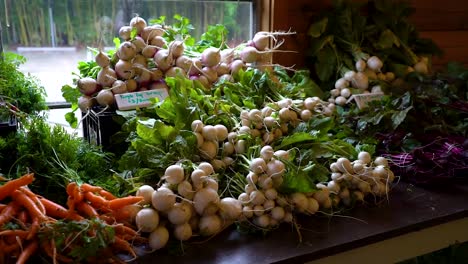 white radishes sit on display in a shop