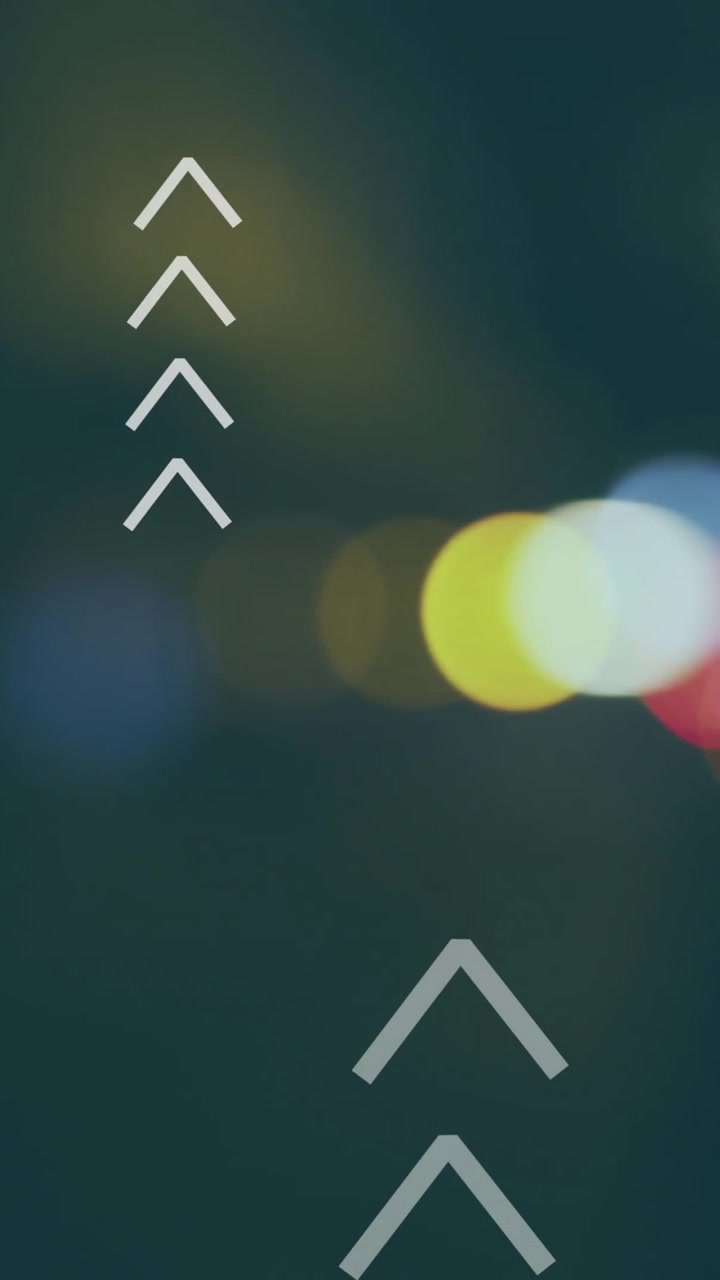 Animation of arrows over city lights