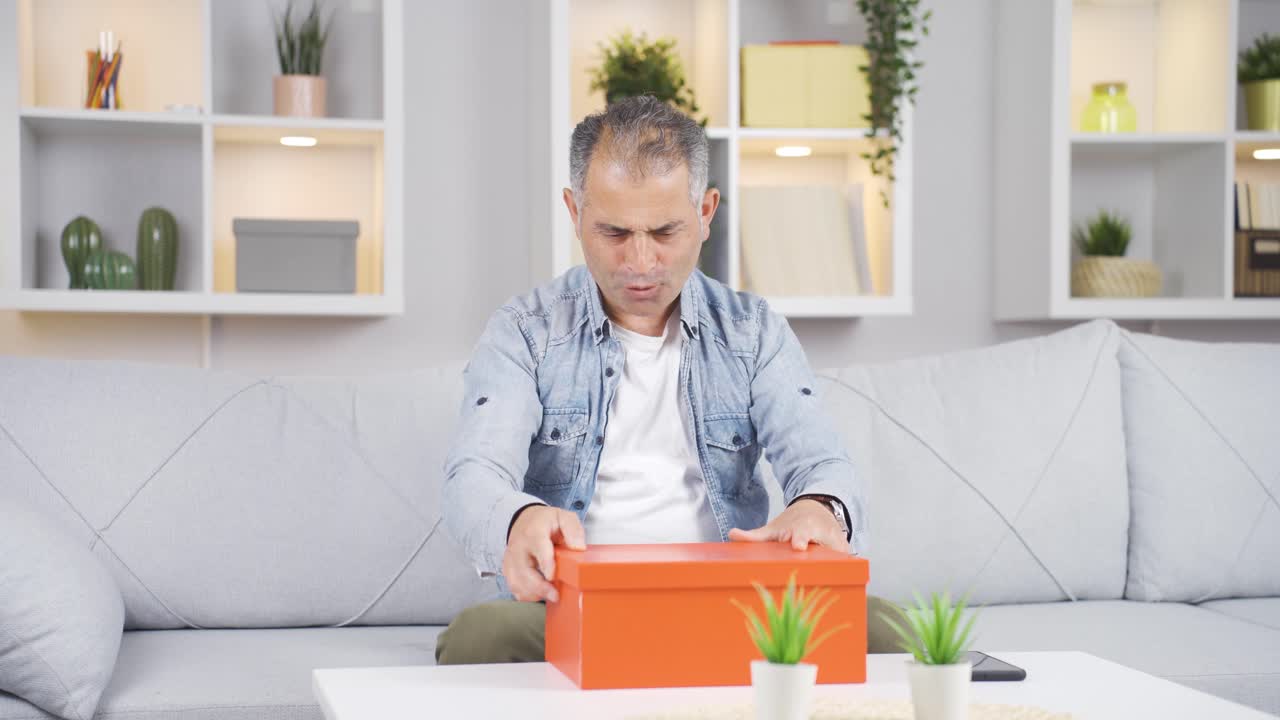 Man waiting for someone at home.