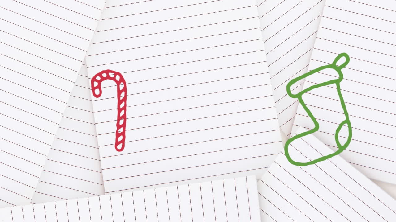 Animation of hand drawing christmas decorations on white paper background