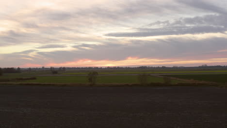 rural agriculture area, during sunset, south west of the netherlands
