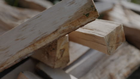 a pile of wooden logs