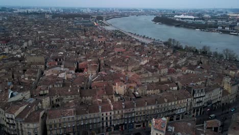 aerial view of bordeaux city and river in france on a gloomy overcast winter day