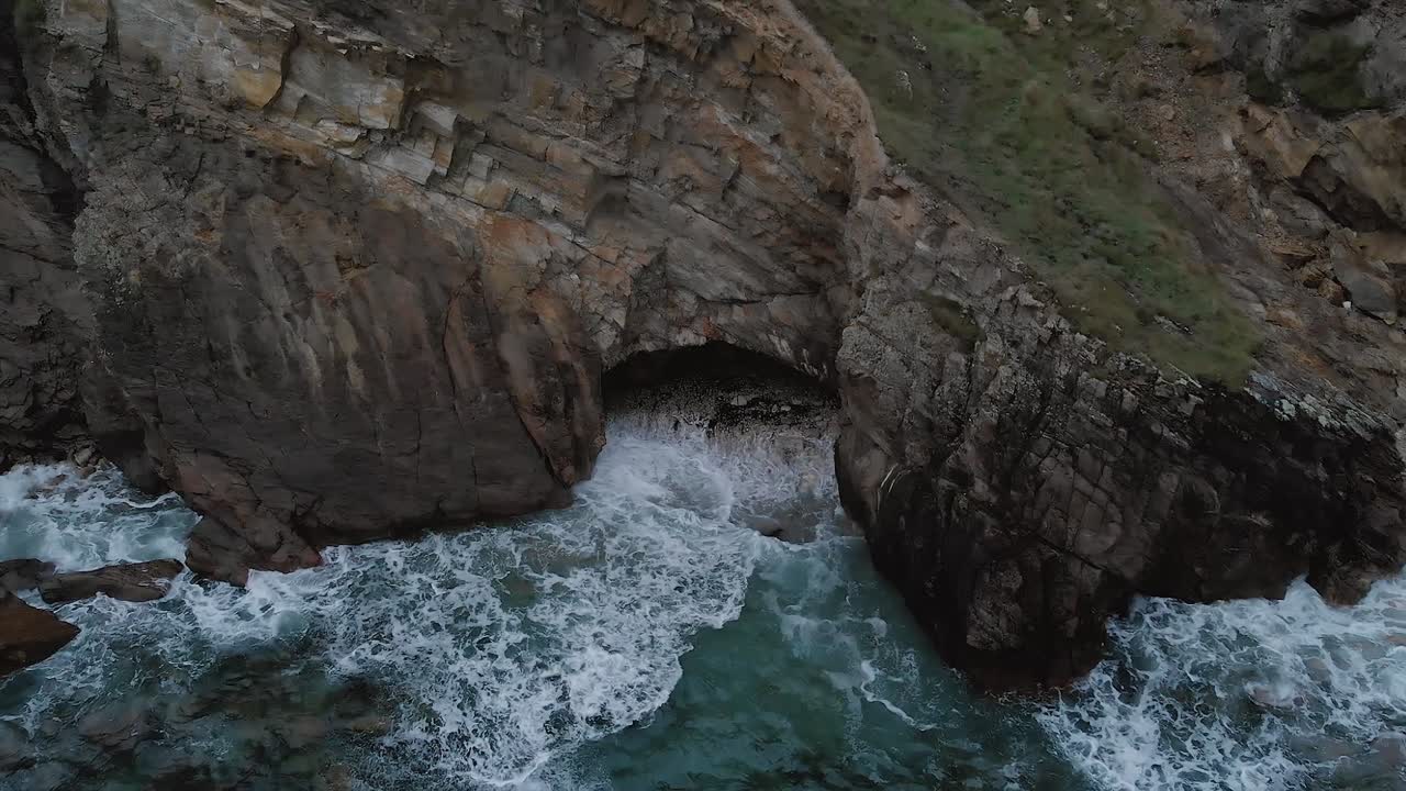 Crohy Head in Donegal Ireland waves crash into cliffs