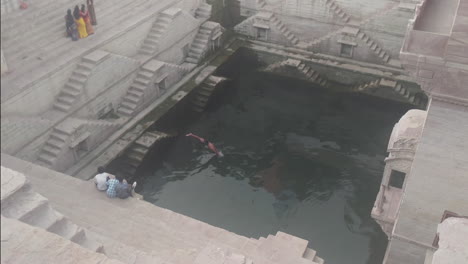 slow motion dive into a beautiful step well in jodhpur india known as toorji ka jhalra or toorji’s step well.