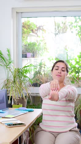 businesswoman stretching his arms.