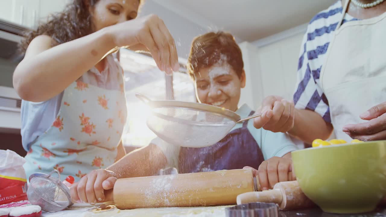 Mother, son and granny preparing cookies in the kitchen 4K 4k