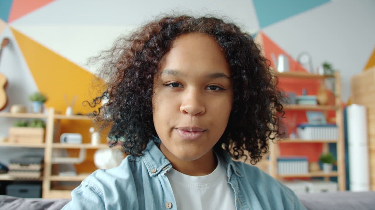 Young Woman Giving Thumbs Up