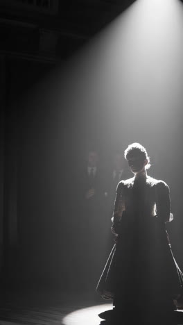 woman in historical dress on stage