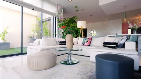 slow revealing shot of a living room with large windows in st gely du fresc