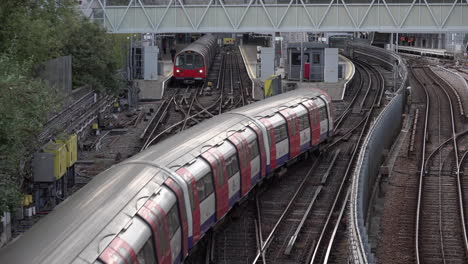 people disembark from packed underground trains arriving at stratford station during rush hour the day after the government relaxed coronavirus lockdown restrictions but said avoid public transport