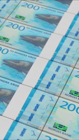 vertical video of 200 danish krone banknotes printed by a money press