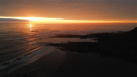 establishing aerial drone shot of cleveland way in scarborough at sunrise