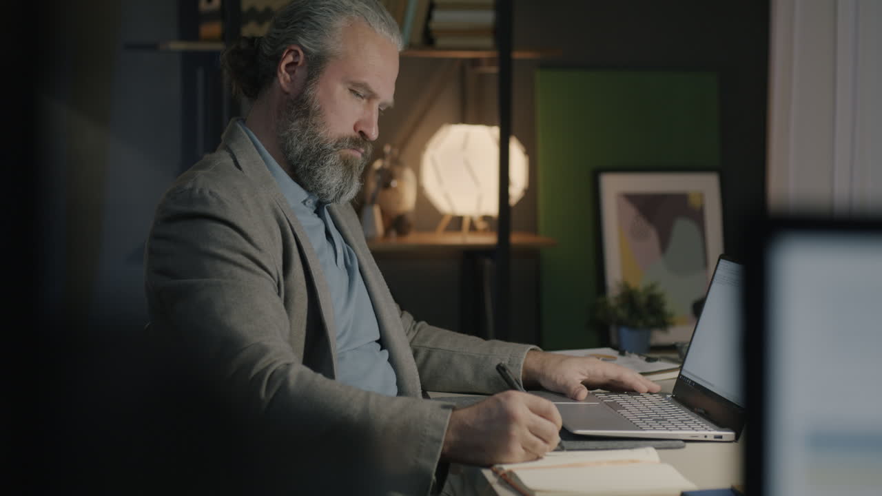 Man working late at home office