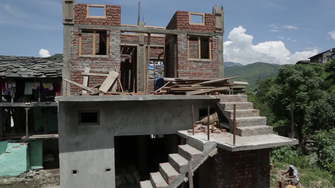 Construction work going on in upper Himalayas, Uttarakhand, India. Bridge construction- Building construction