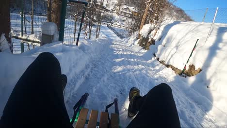 a man sledding downhill