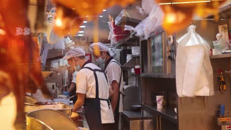 chef preparing food in bustling kitchen