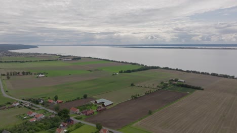 agricultural fields and village seen from the medieval castle brahehus near vattern, sweden