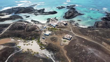 Aerial-drone-panorama-footage-of-the-beautiful-coastline-of-the-Island-of-Wolves-in-Spain