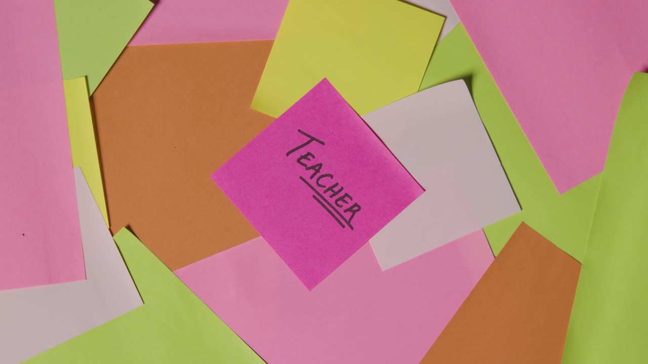 Education Concept Of Revolving Sticky Notes With Teacher Written On Top Note