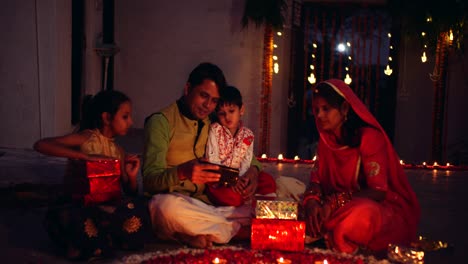 parents with kids celebrate the indian traditional festival of diwali