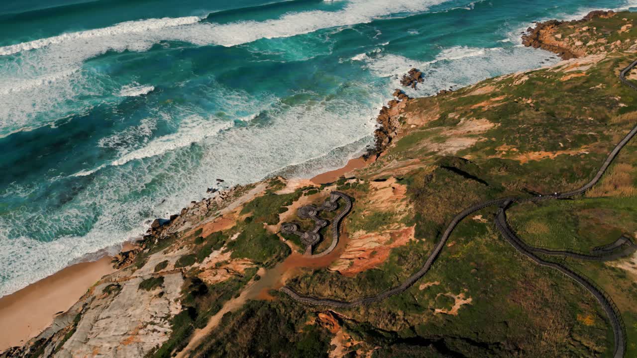 aeria shot over passadicos da foz do arelho on the atlantic coast in Portugal, Oesta region, Portugal