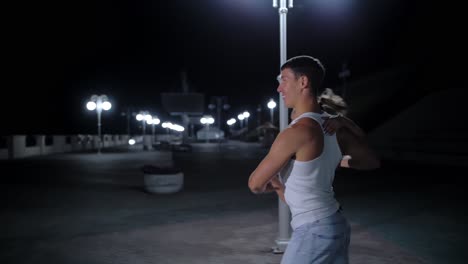 couple dancing at night on the street