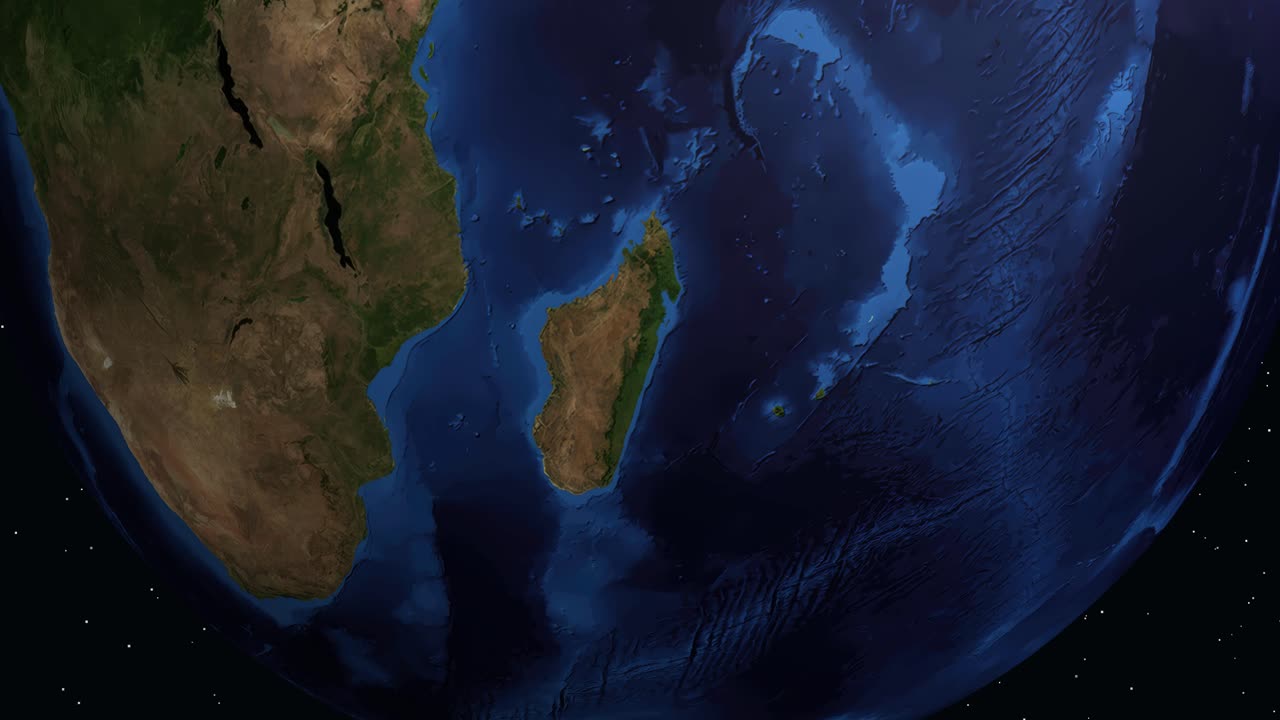 Animazione digitale che zooma dallo spazio profondo fino alla Terra, concentrandosi su Antananarivo, Madagascar, con etichette di testo