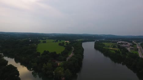 aerial: empty zilker park in austin, texas on cloudy day