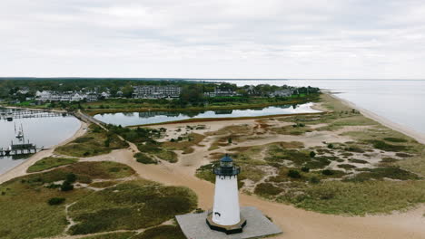 aerial drone around edgartown lighthouse martha's vineyard over beach