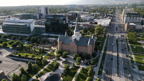 traffic drives past lds mormon temple in provo, utah