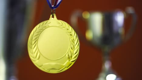 gold medal on orange background