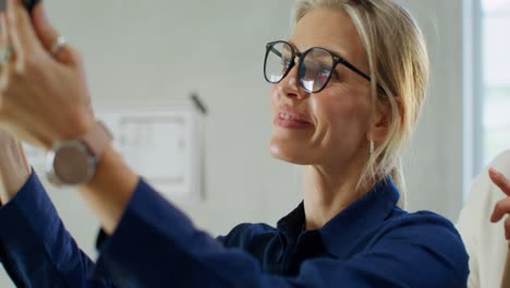 woman taking a selfie in the office