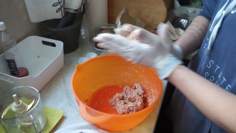 Caucasian-woman-forming-patty-for-homemade-burgers