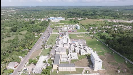 Aerial-flyover-Najayo-prison-in-San-Cristobal-surrounded-by-green-nature-on-Dominican-Republic
