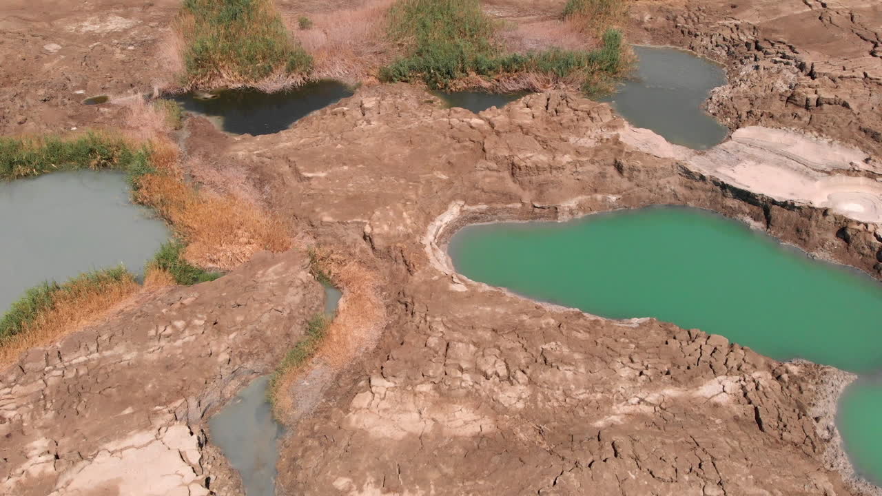 Drone flying over sinkholes and the dead sea