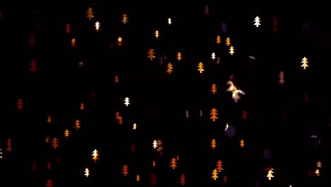 movimiento lento de los pequeños árboles de navidad borrosos y brillantes