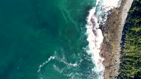 drone still shot of ocean current waves and rocky reef in crystal clear water central coast nsw australia 3840x2160 4k