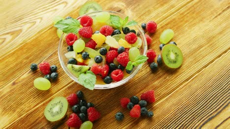 Fruit-salad-in-bowl-on-table-